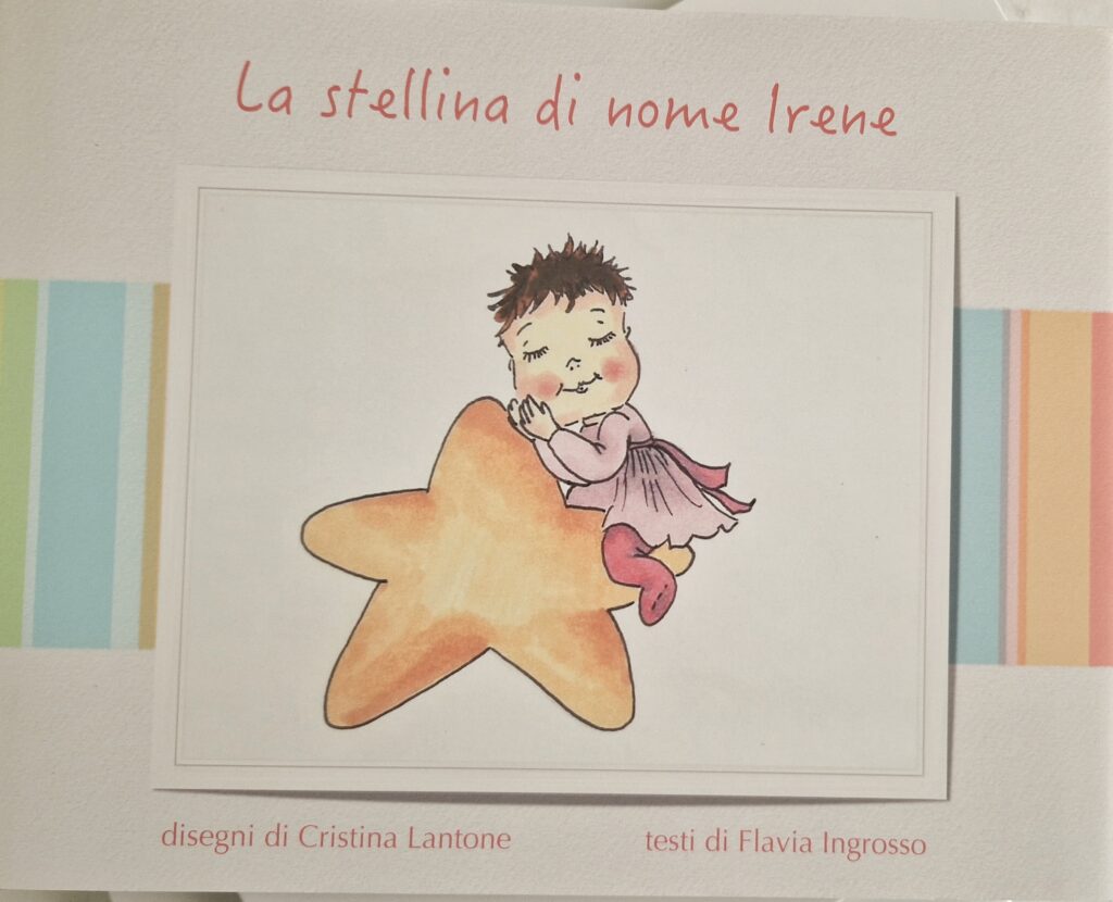 Libro su misura per una bimba, raffigurata dormiente su una stellina